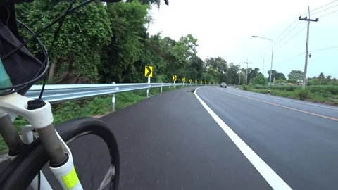 Road motion with cyclist beside Vidéo 247959908
