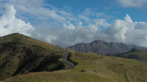 Road by a mountain hill Stock Footage 127582203