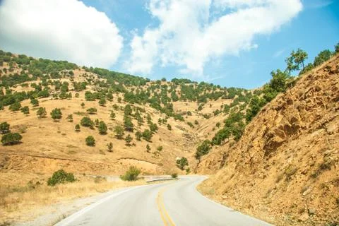 Road in mountain range at olympos mountains Stock Photos