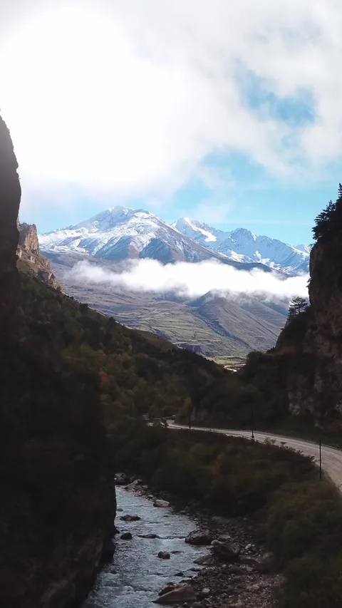 Road to mountain vertical shot Stock Footage 303526670