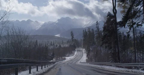 Road with mountains in background. Stock Footage 147643041