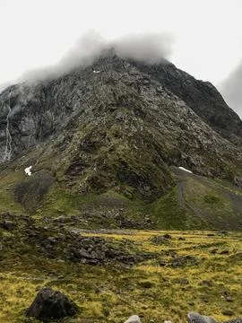 Road in the mountains with clouds Stock Photos