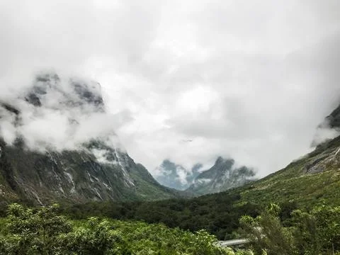 Road in the mountains with clouds Stock Photos