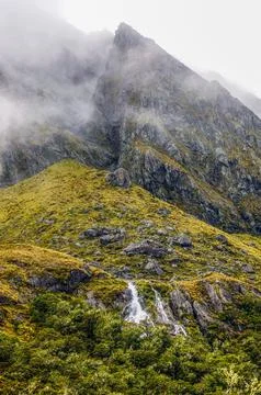Road in the mountains with clouds Stock Photos