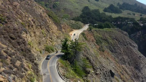 Road On Mountains Next to the Edge of a Cliff Stock Footage 293808379