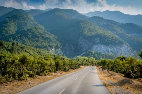 Road to mountains Stock Photos