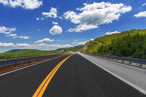 Road to the mountains. Stock Photos