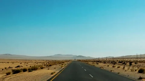 A road in Namibia on a clear, dry, sunny day	 Vídeos de archivo 333108998