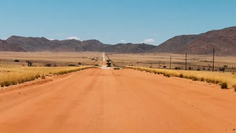 A road in Namibia on a clear, dry, sunny day	 動画素材 333570069