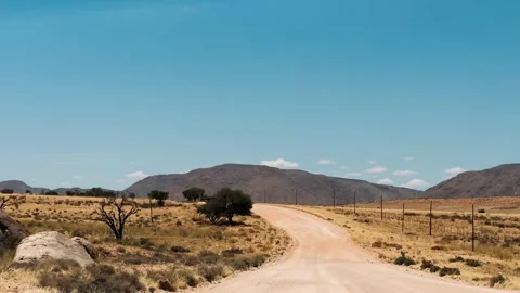 A road in Namibia on a clear, dry, sunny day	 스톡 동영상 333570072