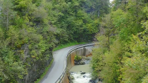Road navigation route to Eisenkappel Vellach reservoir Austria aerial Stock Footage 145410163