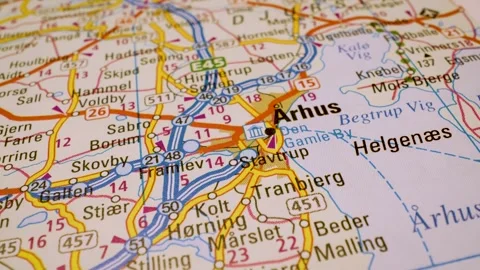 Road network to aarhus, denmark, gliding macro view over atlas map Stock Footage 341269207