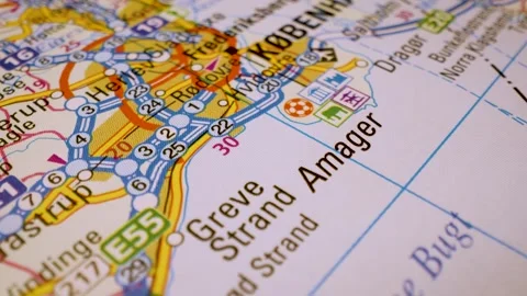 Road network to copenhagen, denmark, gliding macro view over atlas map Stock Footage 341269315