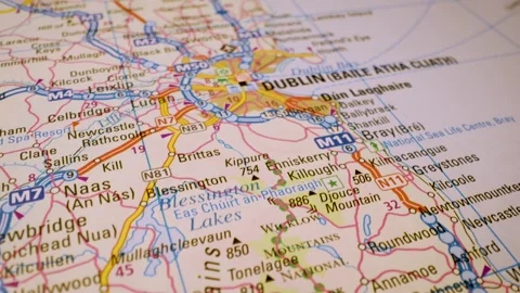 Road network to dublin, ireland, gliding macro view over atlas map Stock Footage 341269256