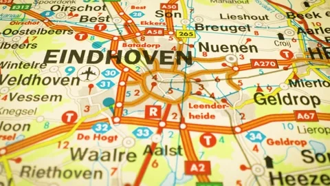Road network leading to eindhoven, netherlands, gliding over atlas map Video stock 344640052