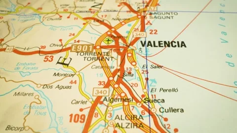 Road network leading to valencia, spain – gliding over atlas map Stock Footage 345385368