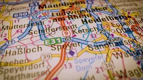 Road network to mannheim, germany, gliding macro view over atlas map Stock Footage 341269441