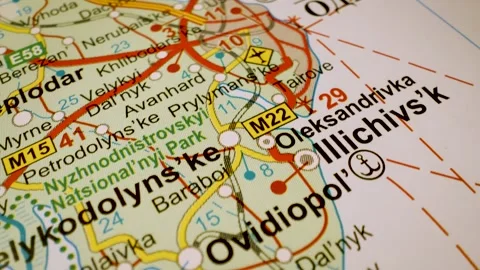 Road network to odesa, ukraine, gliding macro view over atlas map Stock Footage 341269458