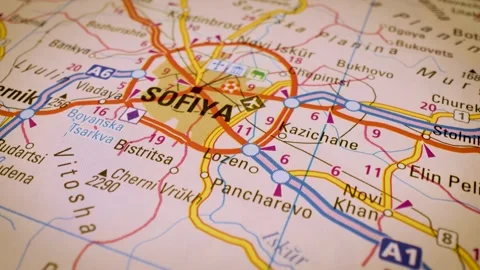 Road network to sofia, bulgaria, gliding macro view over atlas map Stock Footage 341269650