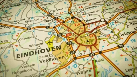 Road network from Tilburg to Eindhoven, Netherlands – gliding over atlas map Stock Footage 346187932