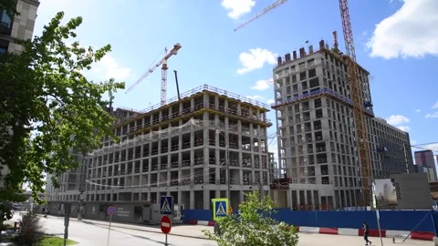 Road next to construction site of modern buildings Stock Footage 277838762