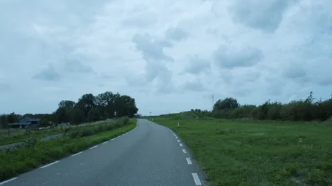 Road Next To A Field Of Grass Video stock 247141243