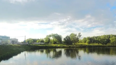 Road next to the park in summer timelapse Stock Footage 77284096