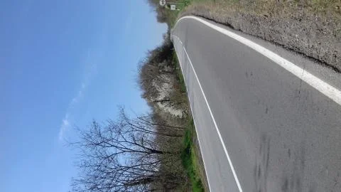 Road on a nice Spring day Stock Photos