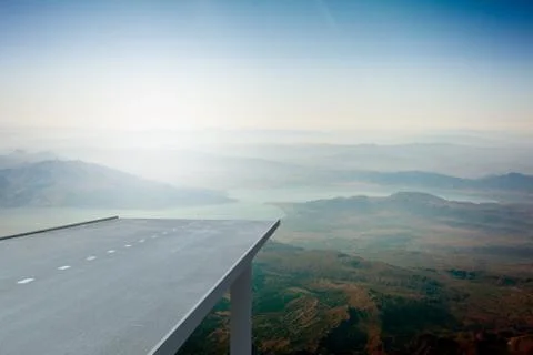 Road over mountains in sky Ilustração Stock