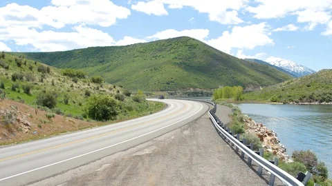 Road pan to lake Stock Footage 89552013
