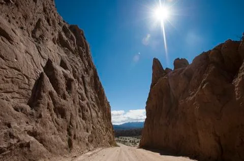 Road passing through dramatic rock formations of Calchaqui valleys Stock Photos