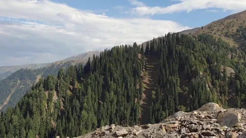 A road passing through a hilly area Stock Footage 251540886