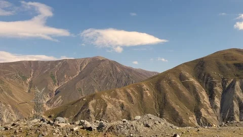 A road passing through a hilly area Stock-Footage 251540898