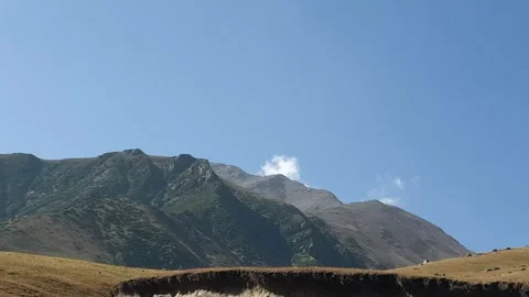 A road passing through a hilly area Stock-Footage 251540903