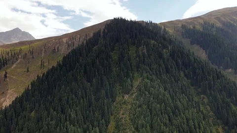 A road passing through a hilly area Stock-Footage 251540906