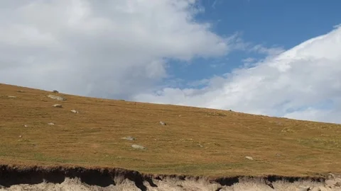 A road passing through a hilly area Stock-Footage 251540907