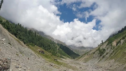 A road passing through a hilly area Stock-Footage 251540940