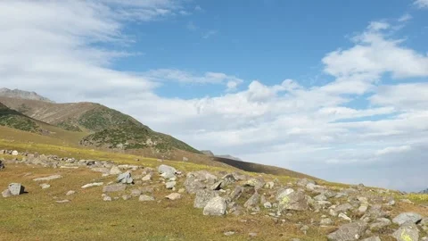 A road passing through a hilly area Stock-Footage 251541004