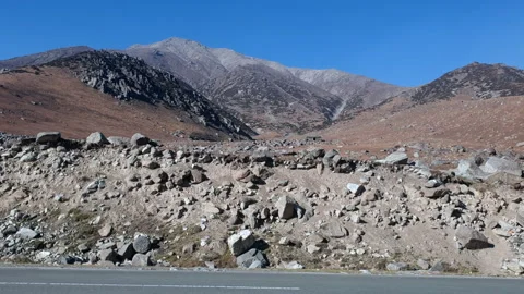 Road passing through mountains Stock Footage 295874019