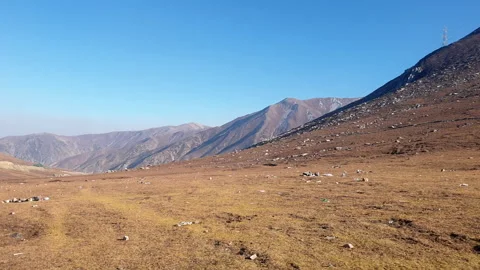 Road passing through mountains Stock Footage 295874069