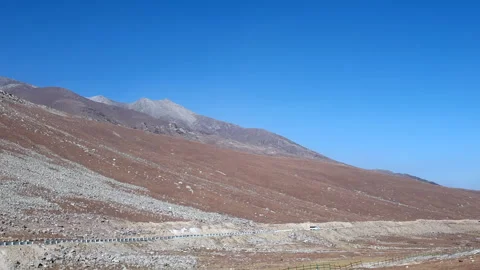 Road passing through mountains Stock Footage 295874089
