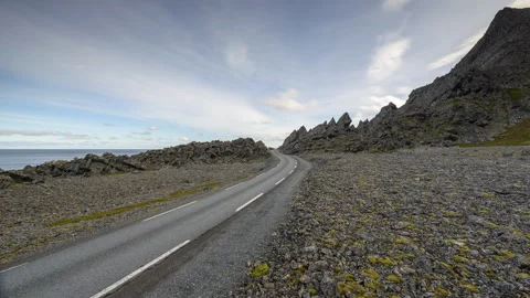 Road passing through the rocky surface Stock Footage 250287438