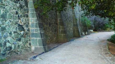 The road is paved with stones before the castle wall Stock Footage 75325983