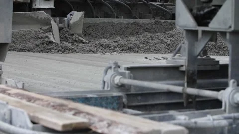 Road paver spreading layer of asphalt concrete mass over highway subbase Video stock 158049599