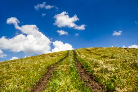 Road to the peak of mountain Stock Photos
