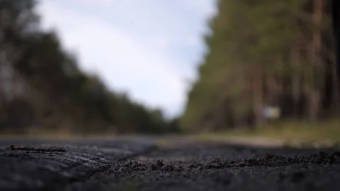 Road pollution. The driver threw a plastic bottle out of the car window. 4K Slow Stock Footage 117846193