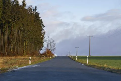 Road with poor road surface, bumpy track Stock Photos