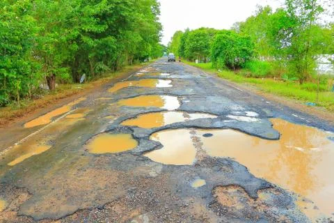 Road with potholes . Foto stock