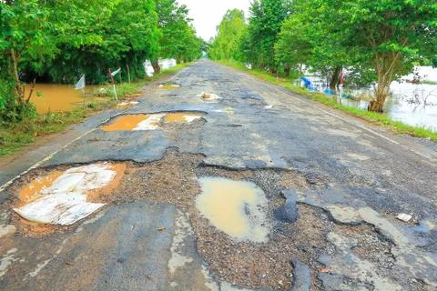 Road with potholes . Stock Photos
