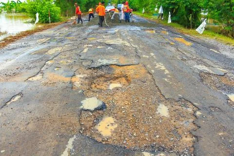 Road with potholes . Stock Photos
